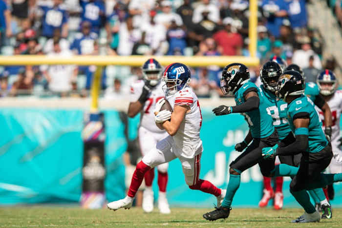 Oct 23, 2022; Jacksonville, Florida, USA; New York Giants wide receiver David Sills V (13) runs the ball against the Jacksonville Jaguars in the second quarter at TIAA Bank Field.